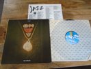 John Coltrane Om vinyl LP US MCA IMPULSE  29024 1980 / Insert