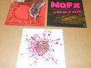 NOFX RIBBED LIVE IN A DIVE CLEAR WITH RED SPLATTER (ONE OF 190) LIMITED VINYL LP