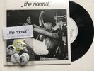 THE NORMAL - WARM LEATHERETTE SIGNED RARE 7'' RECORD AUTOGRAPHED + BADGE SET