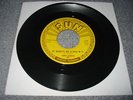 ROCKABILLY - SONNY BURGESS - my bucket's got a hole in it - SUN 285