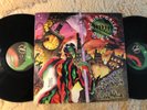 A Tribe  Called Quest.   Beats  Rhymes and life.   2 lp set
