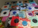 45 rpm vinyl singles The Beatles, The Rolling Stones, Buddy Holly, 1950's