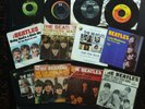 BEATLES COLLECTION TWELVE 45 RPM VINYL RECORDS SOME WITH PICTURE SLEEVES