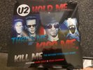 U2 HOLD ME THRILL ME KISS ME KILL ME 12