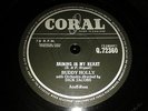 BUDDY HOLLY : RAINING IN MY HEART / IT DOESN'T MATTER ANYMORE.  UK.78 rpm (1958)
