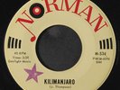 QUARTETTE TRES BIEN: Kilimanjaro / Secretly 45 (sm tol, rubber stamp ol, sl wa