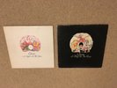 A nice pair of Queen LP records: A night at the opera & A day at the races.