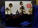 THE EAGLES  SEALED LP HOTEL CALIFORNIA 1976 1ST PRESS RARE GREEN VINYL