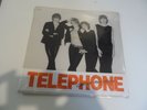 TELEPHONE CRACHE TON VENIN LP NEUF EMBALLE. RARE AVEC LE BANDEAU.