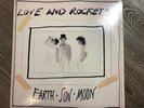 Love And Rockets ?– Earth • Sun • Moon