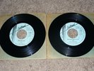 U2 Promo 45's New Years Day & Two Hearts Beat as One. Both Shiny NM- Island Bono