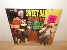 Sweet Daddy Siki . Squares Off With Country Music . Wrestling Superstar . LP