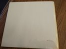 “The Beatles” 1968 early U.K. LP set pressing in near mint unplayed condition