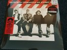 U2 - HOW TO DISMANTLE AN ATOMIC BOMB - HMV EXCLUSIVE RED VINYL + LYRIC BOOKLET