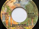 GEORGE HARRISON • Crackerbox Palace • RARE 45 • EL SALVADOR 1976 • BEATLES