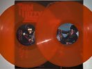 THIN LIZZY, CELTIC ROCKER IN THE EAST (1979), ORANGE COLORED VINYL POSTER #'RD