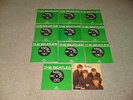 THE BEATLES ELEVEN UK SINGLES IN GREEN PICTURE SLEEVES IN EXCELLENT CONDITION