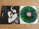 U2 IN THE NAME OF LOVE DORTMUND 21/11/1984 GREEN MULTICOLOURED SPLASHERED VINYL