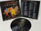QUEEN - A KIND OF MAGIC 12