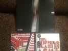 The Strokes First Impression Of Earth Plus Two Singles