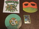 TEENAGE MUTANT NINJA TURTLES “Let’s Kick Shell” 7” Ooze Spill Variant