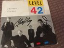 Level 42 - Lessons In Love Vinyl 7” Signed By Mark King Mike Lindup