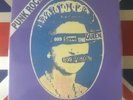 SEX PISTOLS - GOD SAVE THE QUEEN / NO FEELING A&M PURPLE SLEEVE CLEAR VINYL  m/m