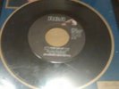 Elvis Presley on Tour vinyl singles.  ITS Now or Never