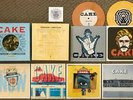 CAKE SHOWROOM OF COMPASSION NM/SS LMTD EDITION 2011 6x 7' 45 RPM SINGLES BOX SET
