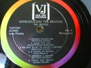 Introducing the Beatles Original 1964 LP Not Reprint Version two Large Brackets