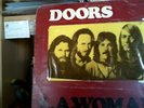 VENDS  33T     THE DOORS LA WOMAN ref 42090