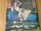DAVID BOWIE - THE MAN WHO SOLD THE WORLD. 1990 LP RECORD W/ BONUS SONGS