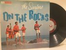 The Surfers On The Rocks