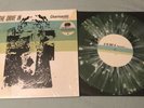 At The Drive In - Diamanté Vinyl RSD Coke Bottle Clear W/ Bone Splatter EP