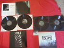 Pretty Hate Machine and with teeth vinyl mint condition