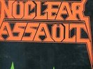 Nuclear Assault Brain Death VG+ LP in shrink.  Combat Records 1986 heavy metal.