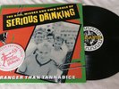 Serious Drinking STRANGER THAN TANNADICE (Hits & Misses) LP 1st UK + Beermat