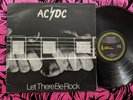 ACDC - Let there be rock. Black Albert label. Australian latter press.