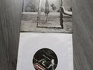 Oasis Roll with it ,Wonderwall and Don't look back 7