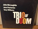 John McLaughlin , Jaco Pastorius and Tony Williams  