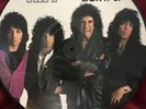 KISS Lick It Up 12