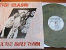 The Clash In A Fah Away Land Grey Beige Marbled Vinyl LP First Press Unplayed