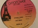 Earl Moody / John Holt ?– Strange Things / The Clock - Reggae 12