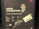 Bruce Springsteen Records, one a boxed Bootleg Performance