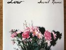 LOW - SECRET NAME NM/NM