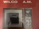 Wilco - A.M. LP  (2015) *(Red/Tangerine Vinyl)* (Vinyl Me, Please Edition)