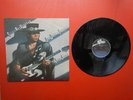 VINYL LP RECORD: STEVIE RAY VAUGHAN: TEXAS FLOOD. EPC 25534. 1983.