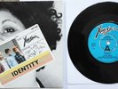 V. RARE X-RAY SPEX GENUINE IDENTITY UK DEMO RELEASE PICTURE COVER. EXCELLENT