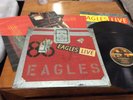 THE EAGLES .EAGLES LIVE .WITH POSTER . 2 LPS..1980  VINYL RECORD