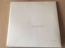 Beatles White Album Signed “To Edward Best Wishes George Martin”.